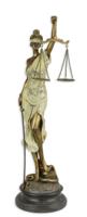 EEN HARSBEELDJE VAN LADY JUSTICE