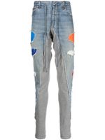 Greg Lauren pantalon de jogging en jean à design patchwork - Bleu