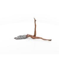 A BRONZE SCULPTURE OF A FEMALE NUDE WITH ONE LEG UP