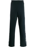 Valentino Garavani pantalon de jogging VLTN à bandes latérales - Bleu