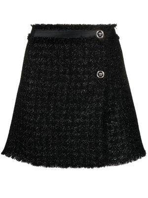 Versace minijupe en tweed à détails effilochés - Noir