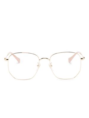 Gucci Eyewear lunettes de vue rondes à plaque logo - Or