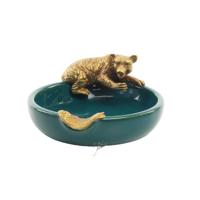 A BRONZE MOUNTED PORCELAIN ASHTRAY