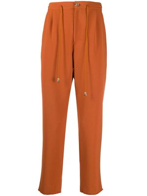Nanushka pantalon de jogging crop - Orange