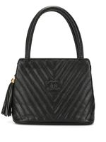 CHANEL Pre-Owned sac à main à logo embossé - Noir