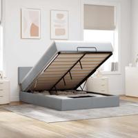 Ottoman bed met matras en LED's 140x200cm stof lichtgrijs