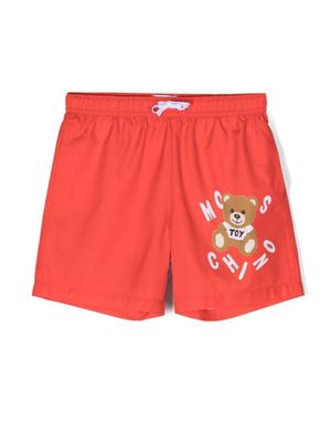 Moschino Kids short de bain à logo imprimé - Rouge Moschino Kids short de bain à logo imprimé - Rouge