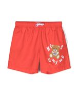 Moschino Kids short de bain à logo imprimé - Rouge