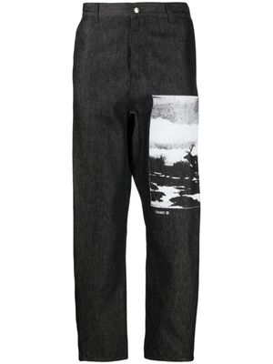 OAMC pantalon en coton biologique à imprimé graphique - Noir