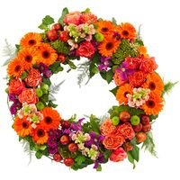 Rouwkrans Ajour oranje bloemen en tintje fuchsia - thumbnail