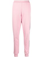 Karl Lagerfeld pantalon de jogging à logo strassé - Rose