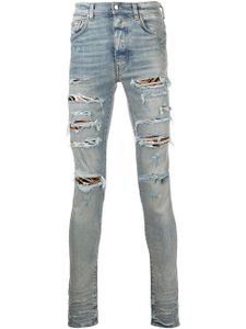 AMIRI jean MX1 skinny à effet usé - Bleu