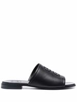 Givenchy claquettes en cuir à logo embossé - Noir