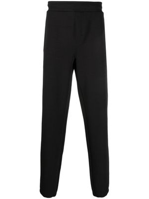 Calvin Klein pantalon de jogging à logo embossé - Noir