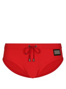 Dolce & Gabbana logo-plaque swim trunks - Rouge