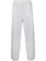 Stüssy pantalon de jogging à logo brodé - Gris