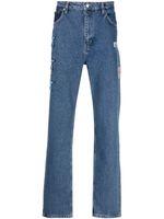 Daily Paper jean slim à patch étoile - Bleu Daily Paper jean slim à patch étoile - Bleu