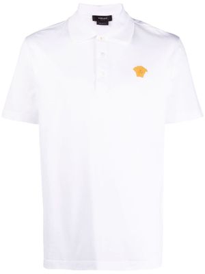 Versace polo à logo brodé Medusa - Blanc