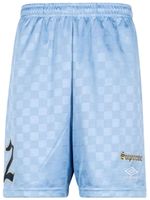 Supreme x Umbro short de football à logo imprimé - Bleu