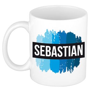 Naam cadeau mok / beker Sebastian met blauwe verfstrepen 300 ml