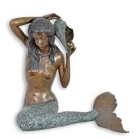A BRONZE MERMAID FOUNTAIN A BRONZE MERMAID FOUNTAIN