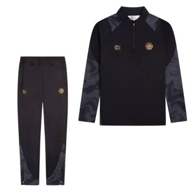 Cruyff Defense Trainingspak 1/4-Zip Kids Zwart Donkergrijs Goud Cruyff Defense Trainingspak 1/4-Zip Kids Zwart Donkergrijs Goud