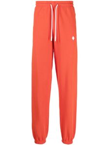 Marcelo Burlon County of Milan pantalon de jogging à logo imprimé - Rouge