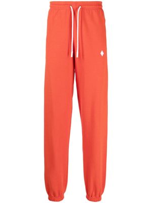 Marcelo Burlon County of Milan pantalon de jogging à logo imprimé - Rouge