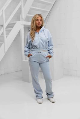Unique The Label Molly Full Zip Trainingspak Dames Lichtblauw - Maat XS - Kleur: Lichtblauw | Soccerfanshop