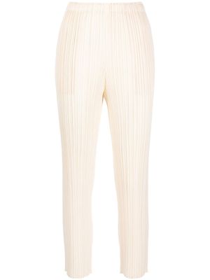 Pleats Please Issey Miyake pantalon court à design plissé - Tons neutres