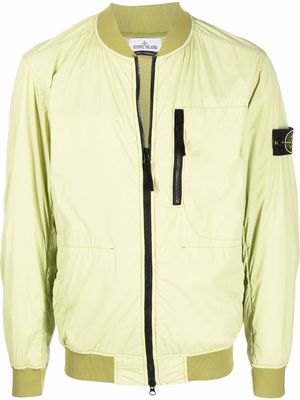 Stone Island veste zippée à motif Compass signature - Vert