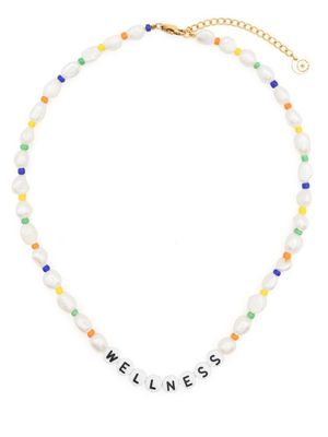 Sporty & Rich collier Wellness serti de perles - Blanc