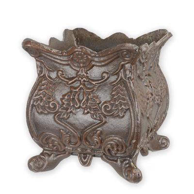 A CAST IRON PLANTER - BROWN