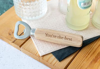 Flesopener hout met gravering