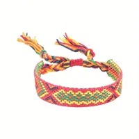 Handgemaakte geweven verstelbare armband uit Nepal met rood-geel-groen motief - Sieraden - Spiritueelboek.nl - thumbnail