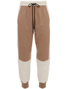 JW Anderson pantalon de jogging à empiècements contrastants - Tons neutres