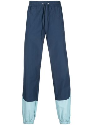 Arte Antwerp pantalon de jogging à empiècements - Bleu