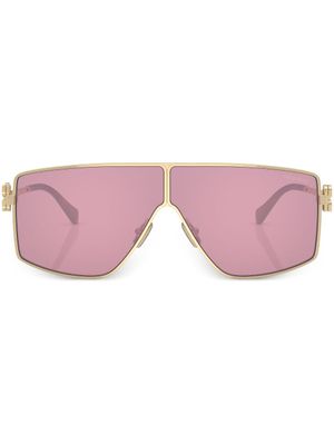 Miu Miu Eyewear lunettes de soleil à monture oversize - Or
