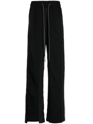 Mostly Heard Rarely Seen pantalon de jogging à détails de rayures - Noir