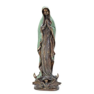 A BRONZE SCULPTURE OF A PRAYING MARY