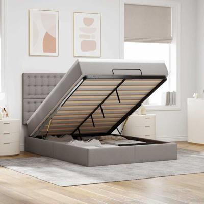 Ottoman bed met matras en LED's 140x200cm stof taupe
