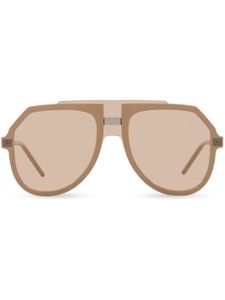 Dolce & Gabbana Eyewear lunettes de soleil oversize à logo gravé - Tons neutres