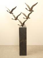5 bronzen zwanen