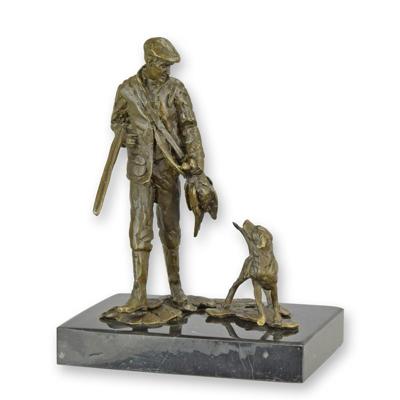 A BRONZE SCULPTURE OF A HUNTER WITH HOUND