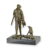 A BRONZE SCULPTURE OF A HUNTER WITH HOUND
