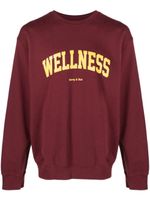 Sporty & Rich pull à logo Wellness imprimé - Rouge