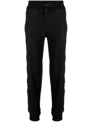 Philipp Plein pantalon de jogging à boutons gravés - Noir