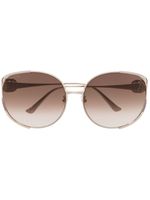 Gucci Eyewear lunettes de soleil GG à monture oversize - Or