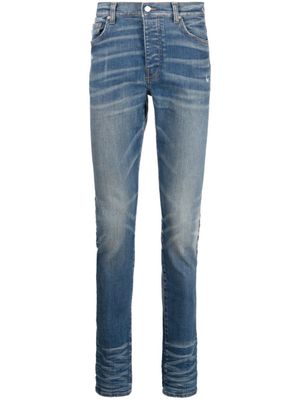 AMIRI jean skinny à taille mi-haute - Bleu