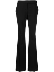 Stella McCartney pantalon de tailleur slim à plis marqués - Noir